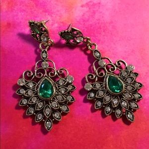 Gold tone emerald and crystal earrings